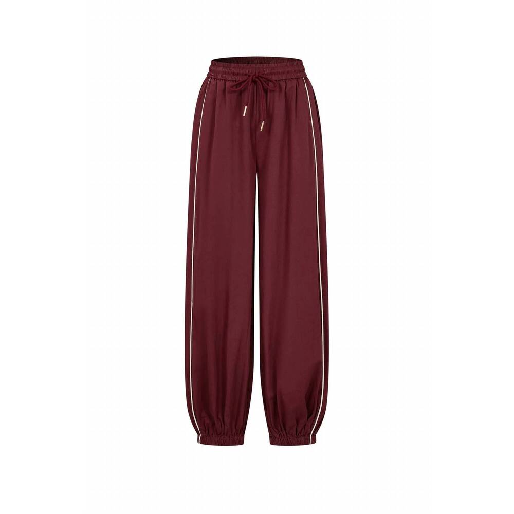 NEW RIVIR women's balloon pants with piping detail in burgundy